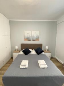 Łóżko lub łóżka w pokoju w obiekcie Armonia Porta Remounda Apartment