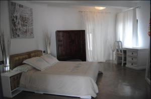 Postel nebo postele na pokoji v ubytování Apartamento El Cuarton