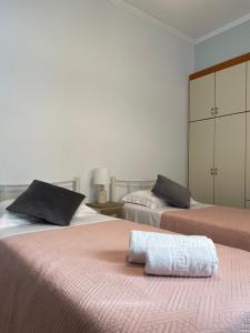 Łóżko lub łóżka w pokoju w obiekcie Armonia Porta Remounda Apartment
