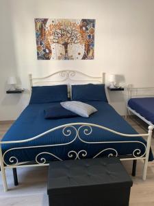 Postel nebo postele na pokoji v ubytování Ca' ToscaLina