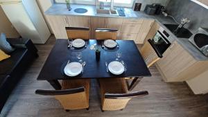Η κουζίνα ή μικρή κουζίνα στο Savaria Apartment Szombathely +17 φωτογραφίες