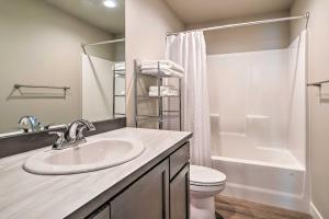 a bathroom with a sink and a toilet at Charming Home with Mtn and Columbia River Views! in East Wenatchee +20 photos