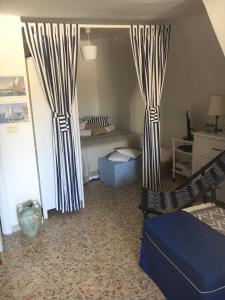 Cama o camas de una habitación en Borghetto Sul Mare