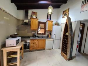 A kitchen or kitchenette at Almendro
