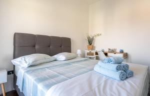 Posteľ alebo postele v izbe v ubytovaní Penthouse Gea