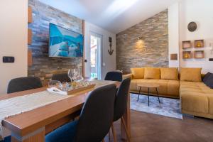 Posedenie v ubytovaní Penthouse Gea