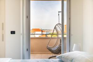 Posteľ alebo postele v izbe v ubytovaní Penthouse Gea