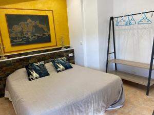 Postel nebo postele na pokoji v ubytování Casa di Floumy