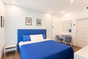 Postel nebo postele na pokoji v ubytování TOFANI APARTMENT - luminoso con terrazzo panoramico