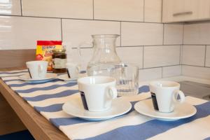 Coffee and tea making facilities at TOFANI APARTMENT - luminoso con terrazzo panoramico