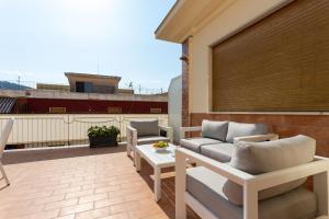 A balcony or terrace at TOFANI APARTMENT - luminoso con terrazzo panoramico