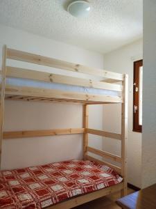 Llit o llits en una habitació de Les Sorbiers - Grand T4 ensoleillé avec Vue Panoramique