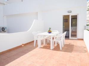 A balcony or terrace at Apartamentos Cala Llonga
