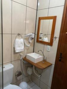Ett badrum på Pousada Chalés Olaria - Exclusiva para Casais