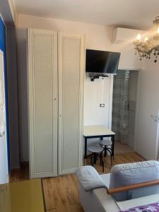 TV a/nebo společenská místnost v ubytování B&B Rialto + 20 fotografií
