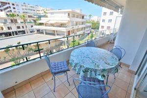 a balcony with a table and chairs on a balcony at Flat in Juan in Antibes
