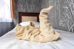 Postel nebo postele na pokoji v ubytování Botel Vodnik
