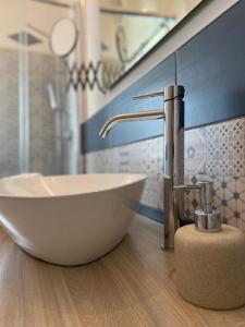 Koupelna v ubytování La Casa di Zia Ninì + 27 fotografií