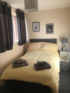 Ένα ή περισσότερα κρεβάτια σε δωμάτιο στο Vogue Apartments +23 φωτογραφίες