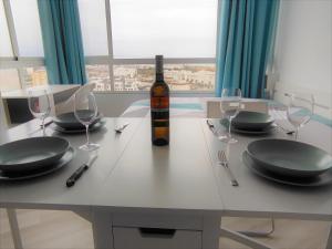 Nápoje v ubytovaní Aqua Apartment