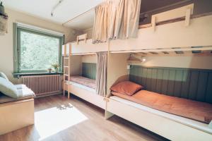 Letto o letti in una camera di FURU Hostel & Café