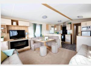 Kuchyň nebo kuchyňský kout v ubytování AJL Caravan Rentals