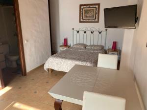 Postel nebo postele na pokoji v ubytování Casa Rural Los Pepe Sancti Petri
