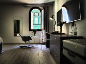 Posedenie v ubytovaní Adelphi Boutique Hotel