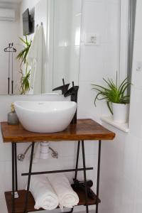 Kúpeľňa v ubytovaní Vinea Suites + 20 fotografií