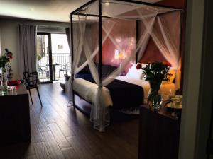 Posteľ alebo postele v izbe v ubytovaní Adelphi Boutique Hotel