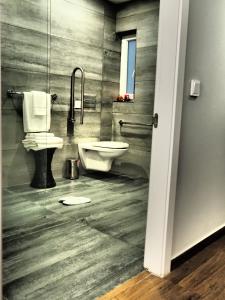 Kúpeľňa v ubytovaní Adelphi Boutique Hotel