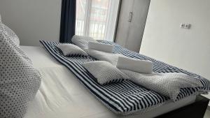Postel nebo postele na pokoji v ubytování Apartmán D5 Nová Pec