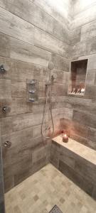 a bathroom with a shower with a tub and a sink at Le Maréchal Duplex - Appartement avec Jacuzzi - CAEN hyper Centre in Caen +49 photos