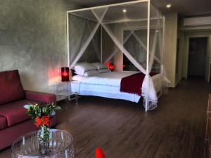 Posteľ alebo postele v izbe v ubytovaní Adelphi Boutique Hotel