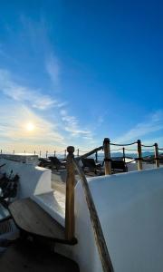 a skate park with a ramp and a bench at Orizon Tagoo Mykonos in Mikonos