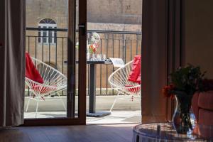 Posedenie v ubytovaní Adelphi Boutique Hotel
