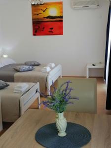 Posteľ alebo postele v izbe v ubytovaní Apartments Kozjan