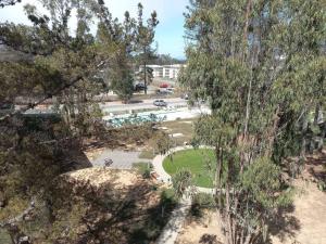 Foto sihtkohas El Tabo asuva majutusasutuse Hermoso Dpto entre bosque y piscina. galeriist