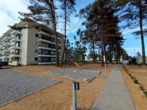 Foto sihtkohas El Tabo asuva majutusasutuse Hermoso Dpto entre bosque y piscina. galeriist +10 fotot