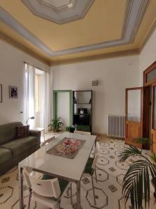 A television and/or entertainment centre at Maddalena House Még 37 kép