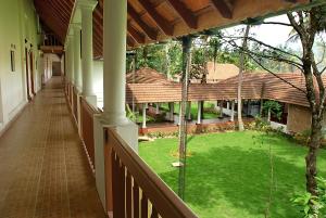 Zahrada ubytování Lemon Tree Vembanad Lake Resort, Kerala