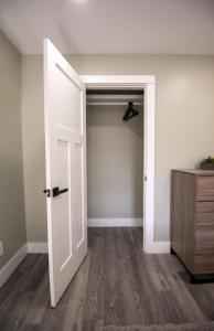 an open door in a room with a closet at The Overlook at Burdett Falls in Burdett