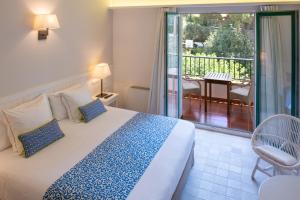 Postel nebo postele na pokoji v ubytování Hotel Playa Sol