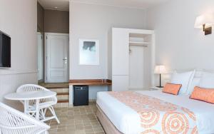 Postel nebo postele na pokoji v ubytování Hotel Playa Sol