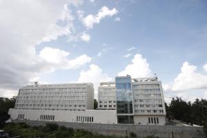 two white buildings with a sky in the background at Keys Select by Lemon Tree Hotels, Whitefield, Bengaluru in Bangalore