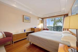 Ένα ή περισσότερα κρεβάτια σε δωμάτιο στο BOCA DO RIO - Apartamento 109 +25 φωτογραφίες
