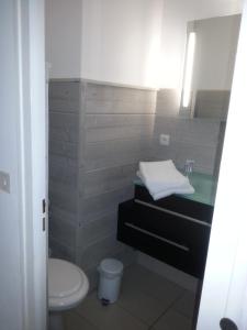 Koupelna v ubytování Hôtel Rent
