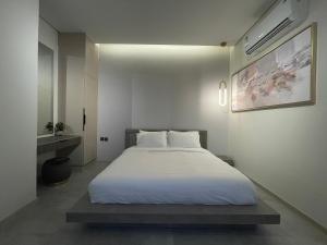 Katil atau katil-katil dalam bilik di شاليهات قصيد الفندقية