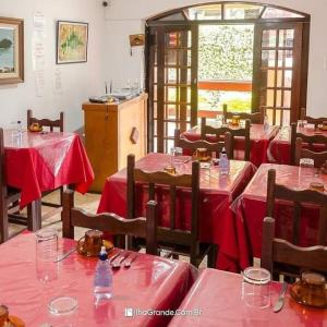Reštaurácia alebo iné gastronomické zariadenie v ubytovaní Pousada Arco Íris