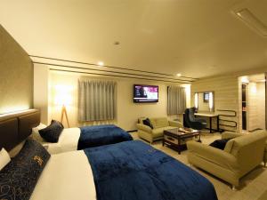 Postelja oz. postelje v sobi nastanitve Green Rich Hotel Matsue Station Across - Artificial hot spring Futamata Yunohana